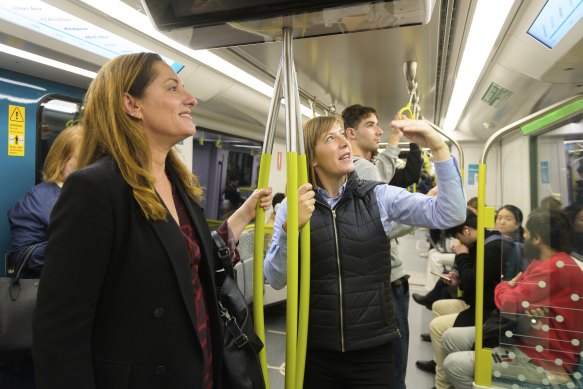 Haylen and Smith ride the metro.