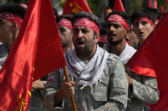 Volunteer troops of the Iranian army march during the Army Day parade on Wednesday.