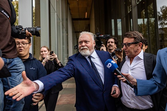 Broadcaster Kyle Sandilands departs the Federal Court on Friday afternoon.
