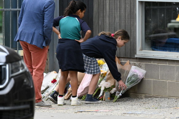 The floral tributes grow outside South Auburn Primary.