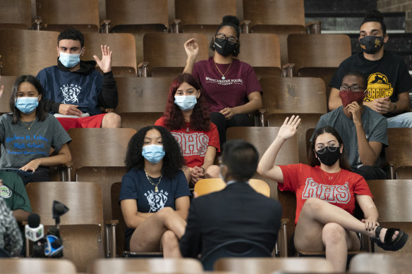 Students at a school in New York join in a discussion about vaccines. 