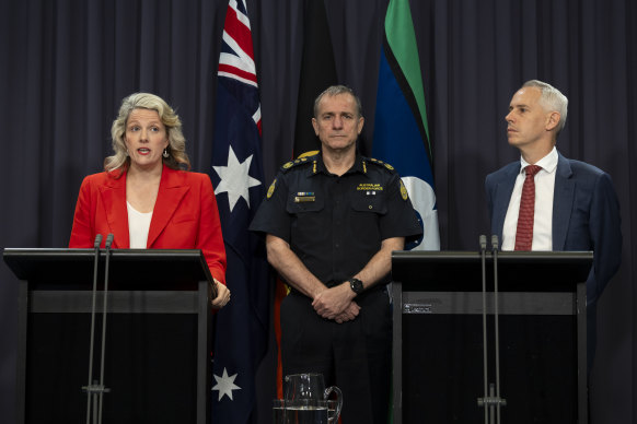 Home Affairs Minister Clare O’Neil, Australian Border Force Commissio<em></em>ner Michael Outram and Immigration Minister Andrew Giles during their Parliament House press co<em></em>nference on Monday.