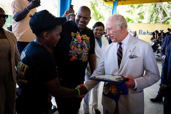 Charles meets a young boxer at the Bahamas Boxing Academy in Nassau.