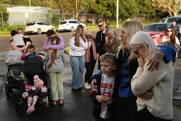 Local families at the Wyong memorial on Monday.