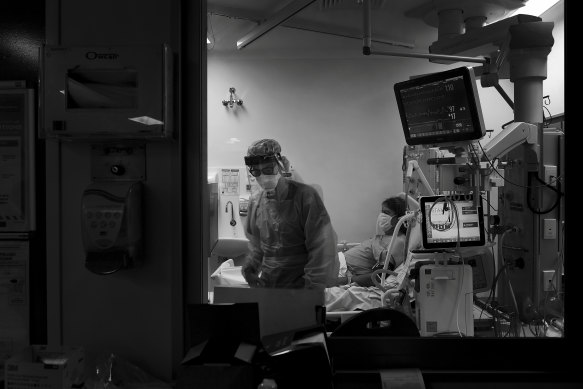 A COVID patient in his 50s, transferred from a quarantine hotel to receive care.