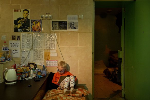 Viktor Baklanov, 3, sits in the basement of a Ukraine hospital, where he is sheltering with his father while his wounded brother Volodymyr is treated in one of the trauma wards. 
