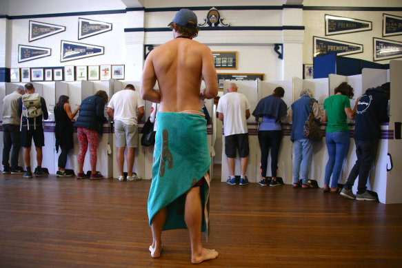 A Sydney voter waits to cast his ballot in the 2019 federal election. 