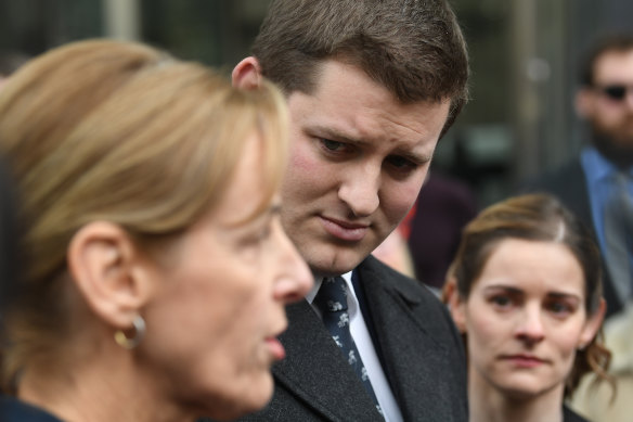 Felix and Pauline Kostiuk speak to the media outside the County Court on Thursday.