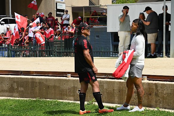 Manase Fainu (right), wearing an ankle bracelet, attends Tonga training while on day release.