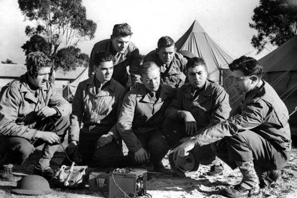 US Soldiers at Camp Pell in Royal Park learn how to use a portable wireless field set in 1942. 