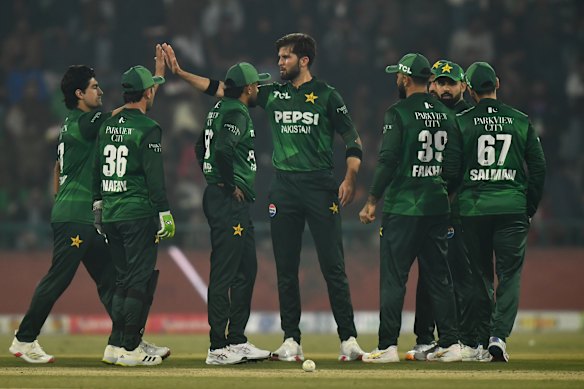 Pakistan players celebrate the wicket of Matthew Renshaw during their win over Australia in Lahore on Sunday.