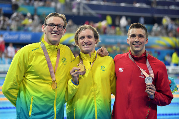Dan Jervis with Australia’s Mack Horton and Jack McLoughlin on the podium for the 1500m freestyle at the 2018 Commonwealth Games.