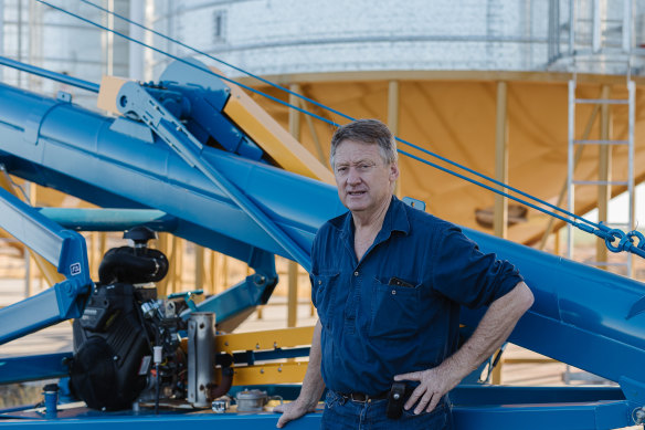 Matthew Madden on his farm near Moree, with a new and safer auger he bought a year ago.