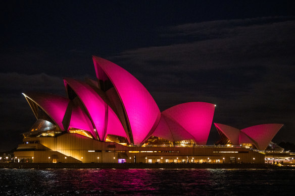 The sails of the Sydney Opera House glowing pink to honour the life of Dame Olivia Newton-John AC DBE and recognise her immense contribution to cancer research and awareness. 