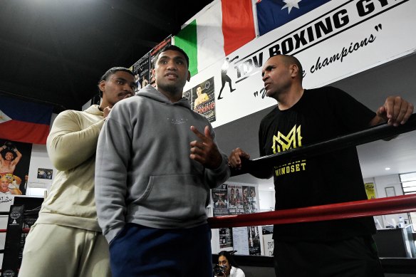 Mundine with Tevita Pangai jnr at the Bondi Boxing Club in Waterloo, where the former Bulldogs prop was sparring, on Thursday.