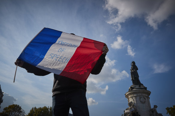 Parisians have been holding vigils for beheaded teacher Samuel Paty.