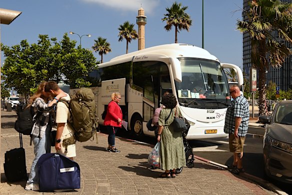 Foreign nationals at the evacuation point in Tel Aviv, where the Australian embassy evacuated citizens on June 24, 2025.