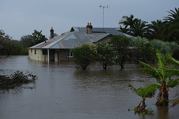 A private property inundated by water on the banks of the Wallamba River on The Lakes Way near Tuncurry, NSW in May 2025.