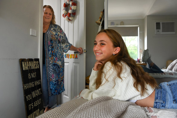 Amanda DeLuca with her daughter Cienna, 13, at the family home in Blacktown.