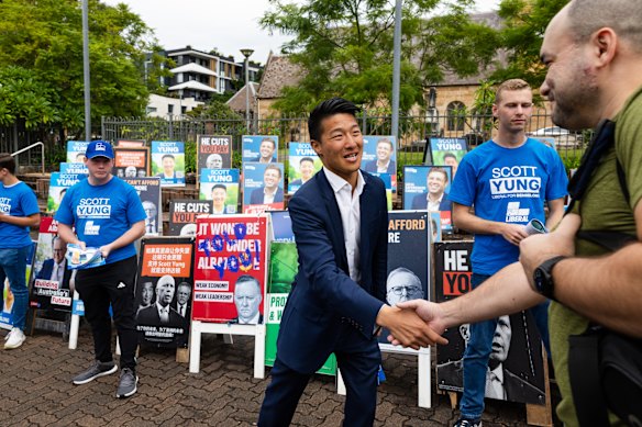 Liberal candidate Scott Yung meeting voters in Bennelong on Tuesday. 