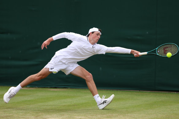 Maximilian Carrier of Great Britain plays a forehand against Kaylan Bigun of the United States in his boy’s singles first round match.