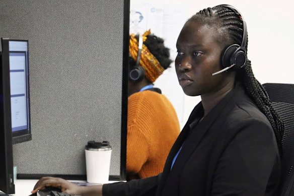 A support worker handles a call. 