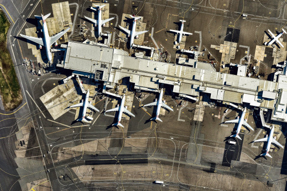 Planes parked at Sydney Airport. The Sydney-Melbourne route is again one of the world’s busiest since air travel returned after pandemic restrictions ended.