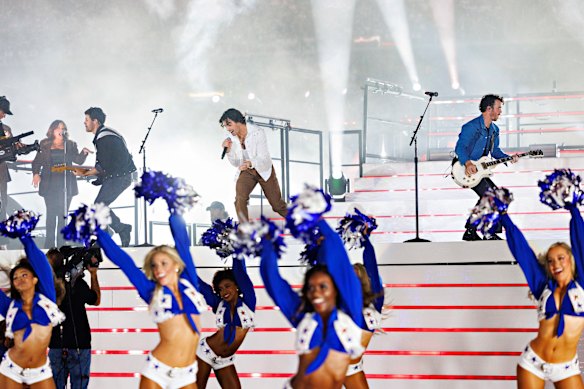 Jonas Brothers at half-time during a game between the Dallas Cowboys and the New York Giants in 2022.