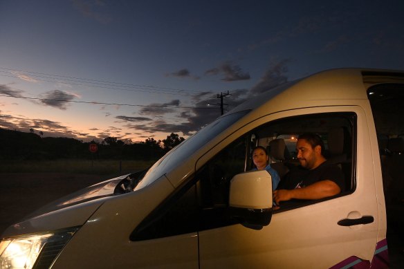 Kiri McKay, 23, and her brother Paumea McKay, 32, driving the Tangentyere bus which provides safe passage home for people in the city and town camps.