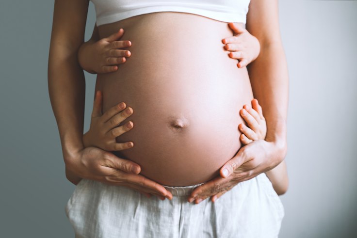 What happens in a woman's body when she becomes a mother?