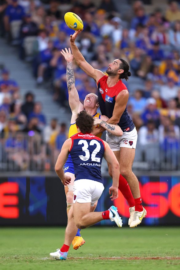 Brodie Grundy flies high on Sunday.
