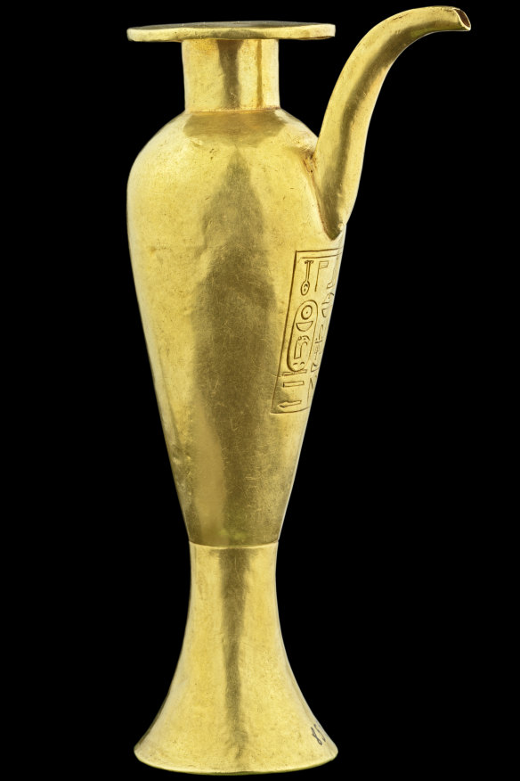 A gold spouted heset vase with inscribed cartouches of Ahmose I. 