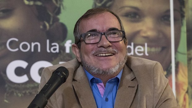 Former guerilla leader, Rodrigo Londono, smiles during a press conference last month.