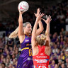 Gretel Bueta of the Firebirds in action against the NSW Swifts in round one.