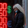 Russians rush to withdraw money as they brace for another currency crisis