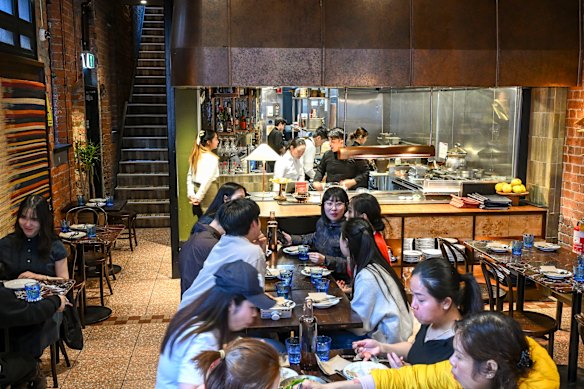 Boon Choou is located in a pretty heritage building with exposed brick walls and green banquettes.