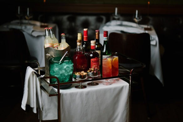 A trolley is wheeled around Bianchetto to dispense Americano cocktails.