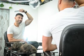 Mark Twiname, founder of Mane Systems in Melbourne, a hair replacement system studio in Melbourne, also wears a hair piece.