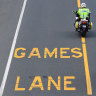 A police officer patrols near a designated Commonwealth Games Lane on the Gold Coast, Wednesday, March 28, 2018. Games Lanes will be activated over the weekend of 31 March for use by accredited vehicles travelling along the Games Route Network which links the Commonwealth Games Village at Parklands to key venues at Southport, Broadbeach and Carrara. (AAP Image/Dave Hunt) NO ARCHIVING . FOR BRISBANE TIMES USE.