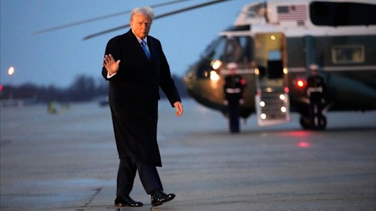 President Donald Trump prepares to board Air Force One on Friday, en route to his Mar-a-Lago estate in Palm Beach, Florida.