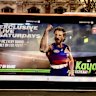 An advertisement for Kayo Sports promoting their exclusive Fox Footy AFL coverage on Saturdays.