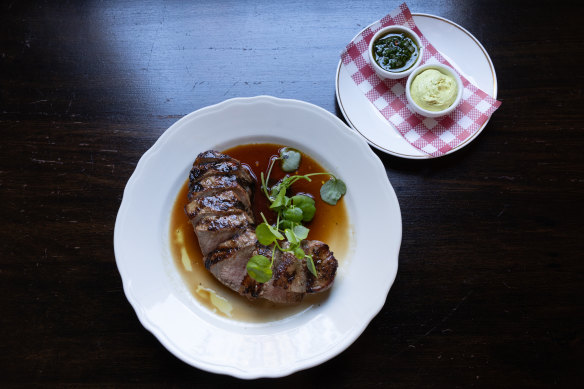 Grass-fed porterhouse is served with chimichurri or Cafe de Paris butter.