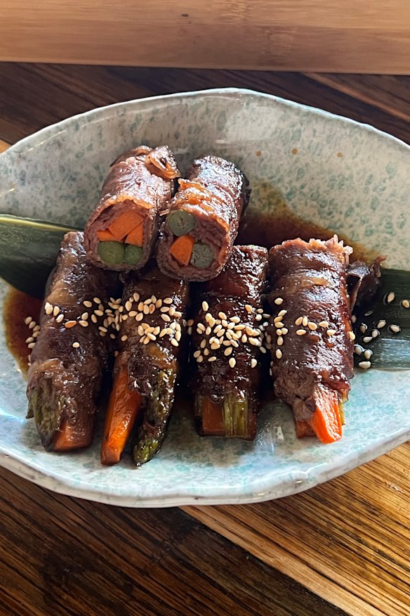 Wagyu wrapped with asparagus and carrot.