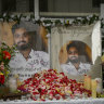 
Protesters outside the Department of Home Affairs Office in Melbourne’s Docklands on Thursday display portraits of a 23-year-old asylum seeker who died in Melbourne on Wednesday after setting himself on fire.