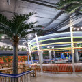 A circular bar with carnival lighting is the focus of Doglands’ main space.