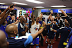 Juninho Bacuna leads celebrations for Curaçao in the locker rooms. 