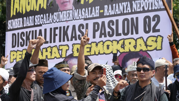 Protesters at a rally allege widespread fraud in the February 14 presidential election.