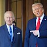 FILE - President Donald Trump gestures next to Britain's King Charles III before leaving Windsor Castle, Windsor, England, Sept. 18, 2025. (AP Photo/Evan Vucci, file)