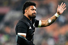Ardie Savea waves towards the fans.