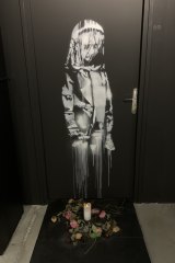An artist’s reproduction of Banksy’s door tribute to the Bataclan terror victims installed at The World Of Banksy Expo currently showing in Paris.